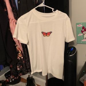 White tee with butterfly print